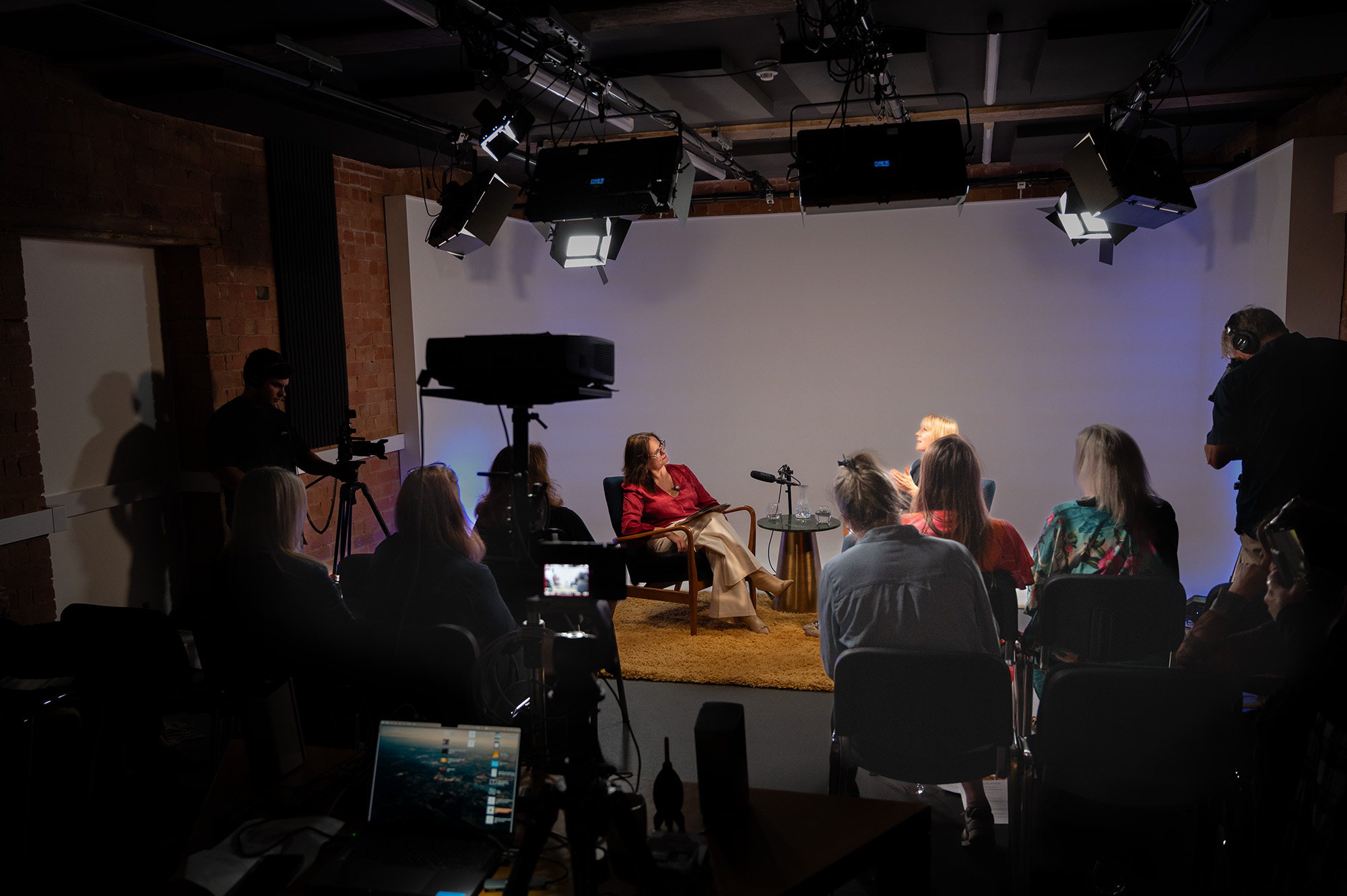 Behind the scenes at an Iconic Impact Studios production day, live filming in front of the audience